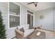 Inviting screened-in porch with wicker seating and natural light at 3028 Quinebaug Rd, Fort Mill, SC 29715