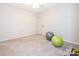 Finished basement with exercise equipment provides versatile space for activities and recreation at 3033 Beech Ct, Indian Trail, NC 28079