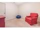 Cozy bedroom with a red chair and red dresser provides a comfortable and relaxing space at 3033 Beech Ct, Indian Trail, NC 28079