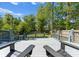 Outdoor deck with wooded view, perfect for relaxing and enjoying the scenery at 3423 Sudbury Rd, Charlotte, NC 28205