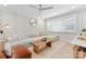 Bright living room featuring hardwood floors, neutral walls, contemporary furnishings, and a large window for ample natural light at 3423 Sudbury Rd, Charlotte, NC 28205