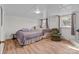Finished basement with two beds, cozy seating and a laminate floor at 365 Pine Hill Rd, Salisbury, NC 28144