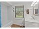 Bright bathroom featuring a bathtub with white subway tile and a window at 365 Pine Hill Rd, Salisbury, NC 28144