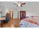 Comfortable bedroom featuring hardwood floors and ample storage space at 365 Pine Hill Rd, Salisbury, NC 28144