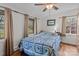 Cozy bedroom with hardwood floors, bright windows, and comfortable furnishings and decor at 365 Pine Hill Rd, Salisbury, NC 28144