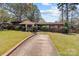 Quaint home with a well-kept lawn and an inviting walkway at 365 Pine Hill Rd, Salisbury, NC 28144