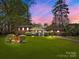 Charming brick home with a well-manicured lawn and beautiful landscaping at 365 Pine Hill Rd, Salisbury, NC 28144