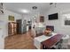 Bright kitchen area with stainless steel appliances and wood floors at 365 Pine Hill Rd, Salisbury, NC 28144