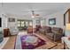 Spacious living room with ceiling fan, sliding glass doors, and traditional decor at 365 Pine Hill Rd, Salisbury, NC 28144