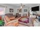 Spacious living room with hardwood floors, cozy seating, and natural light at 365 Pine Hill Rd, Salisbury, NC 28144