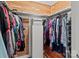 Spacious walk-in closet featuring ample hanging space, built-in shelving, and cedar lined walls at 365 Pine Hill Rd, Salisbury, NC 28144