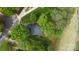 Aerial view of home with a lush yard, mature trees and well maintained landscaping at 3764 Glenn Oaks Dr, Maiden, NC 28650