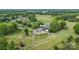 Aerial view of golf course clubhouse with manicured lawns and parking at 3764 Glenn Oaks Dr, Maiden, NC 28650