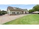 Attractive building exterior with stone accents and ample parking on a beautifully landscaped lawn at 3764 Glenn Oaks Dr, Maiden, NC 28650