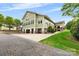 Beautiful exterior elevation with stone accents, covered parking, and well-maintained landscaping at 3764 Glenn Oaks Dr, Maiden, NC 28650