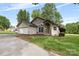A charming, single-story stucco home with a stone-accented entrance and a well-kept lawn at 3764 Glenn Oaks Dr, Maiden, NC 28650
