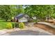 Charming home with a well-maintained lawn, mature trees, and a driveway at 3764 Glenn Oaks Dr, Maiden, NC 28650