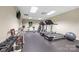 Exercise room featuring treadmills, weights, and fitness equipment for a complete workout at 3764 Glenn Oaks Dr, Maiden, NC 28650