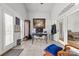 Office space with natural light coming from the many windows and decorative chair at 3764 Glenn Oaks Dr, Maiden, NC 28650