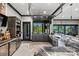Modern bar area with marble countertops, premium appliances, ample storage, and a pass-through window to the outside at 385 Squirrel Ln, Clover, SC 29710
