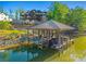 A covered boat dock with room for two boats and a personal watercraft in a calm cove at 385 Squirrel Ln, Clover, SC 29710