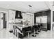 Modern kitchen featuring an oversized island, granite countertops, stainless steel appliances, and custom cabinets at 385 Squirrel Ln, Clover, SC 29710
