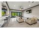 Modern living room featuring sleek floors, a large flat screen TV, and sliding glass doors at 385 Squirrel Ln, Clover, SC 29710