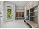 Well-organized mudroom features built-in storage, bench seating, and a view of the outdoors at 385 Squirrel Ln, Clover, SC 29710