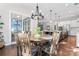 Open dining area flowing from the kitchen and living space, featuring a round table and natural light at 4012 Brandywine Ter, Lancaster, SC 29720