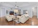 Relaxing living room with modern sofas, stylish decor, and a spacious layout perfect for entertaining guests at 4012 Brandywine Ter, Lancaster, SC 29720