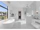 Bright bathroom with marble tile, a glass shower, and modern fixtures at 405 Sugar Maple Ln # 41, Weddington, NC 28104