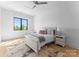 Bright bedroom with hardwood floors, a white wood bed, and a neutral color palette at 405 Sugar Maple Ln # 41, Weddington, NC 28104