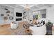 Bright living room features a fireplace, built-in shelves, and cozy, modern furniture at 405 Sugar Maple Ln # 41, Weddington, NC 28104