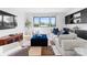 Spacious living room with a large sectional, built-in bar, and ample natural light at 405 Sugar Maple Ln # 41, Weddington, NC 28104