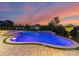 Expansive swimming pool and spa area with a beautiful stone patio, offering a resort-like experience at 405 Sugar Maple Ln # 41, Weddington, NC 28104