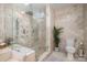 Modern bathroom featuring a glass shower with bench and multi shower heads at 4517 Lake Shore N Rd, Denver, NC 28037
