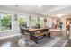 Inviting dining area with natural light, a spacious table, and stylish decor at 4517 Lake Shore N Rd, Denver, NC 28037