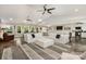 Expansive living area with modern sofas, a stylish rug, and open layout at 4517 Lake Shore N Rd, Denver, NC 28037