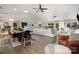Bright, open living space with modern furnishings, hardwood floors, and seamless flow into the dining area at 4517 Lake Shore N Rd, Denver, NC 28037