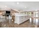 Spacious open living space with hardwood floors, a fireplace, and seamless flow at 4517 Lake Shore N Rd, Denver, NC 28037