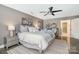 Comfortable main bedroom with soft bedding, natural light, and stylish decor at 4517 Lake Shore N Rd, Denver, NC 28037