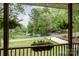 Scenic view from the porch, showcasing the lush greenery and peaceful surroundings at 4517 Lake Shore N Rd, Denver, NC 28037