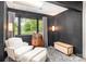 Cozy room featuring comfortable armchairs, a decorative barrel, and natural light from a large window at 4517 Lake Shore N Rd, Denver, NC 28037