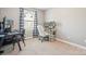 Bedroom with a window view and carpeted floors at 4648 Craigmoss Ln, Charlotte, NC 28278