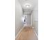 Hallway with carpeted floor and access to the attic at 4648 Craigmoss Ln, Charlotte, NC 28278