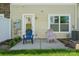 Cozy patio with outdoor seating, perfect for relaxing, and views of the home's exterior at 4648 Craigmoss Ln, Charlotte, NC 28278