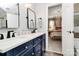 En suite bathroom featuring a double sink vanity with a view into the bedroom at 503 Bridgestone Ct, Gastonia, NC 28056