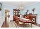 Dining room with beautiful chandelier, hardwood floors, and elegant decor at 503 Bridgestone Ct, Gastonia, NC 28056