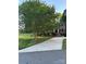 Charming two-story brick home with a well-manicured lawn and mature trees at 503 Bridgestone Ct, Gastonia, NC 28056