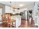 Bright kitchen features stainless steel appliances, a breakfast bar with seating, and granite countertops at 503 Bridgestone Ct, Gastonia, NC 28056